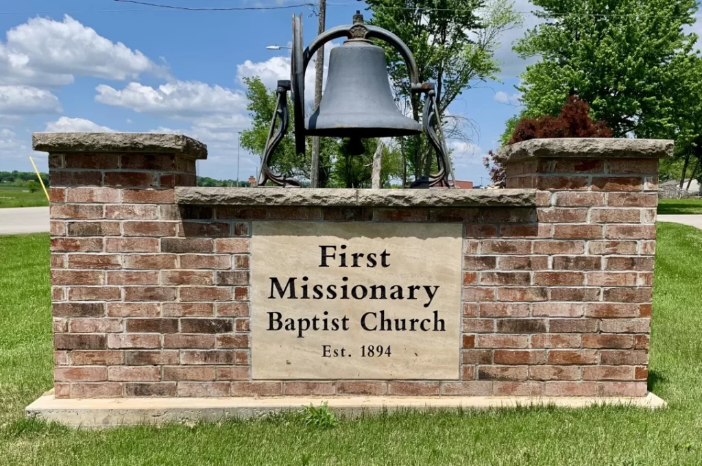 Brick sign with bell
